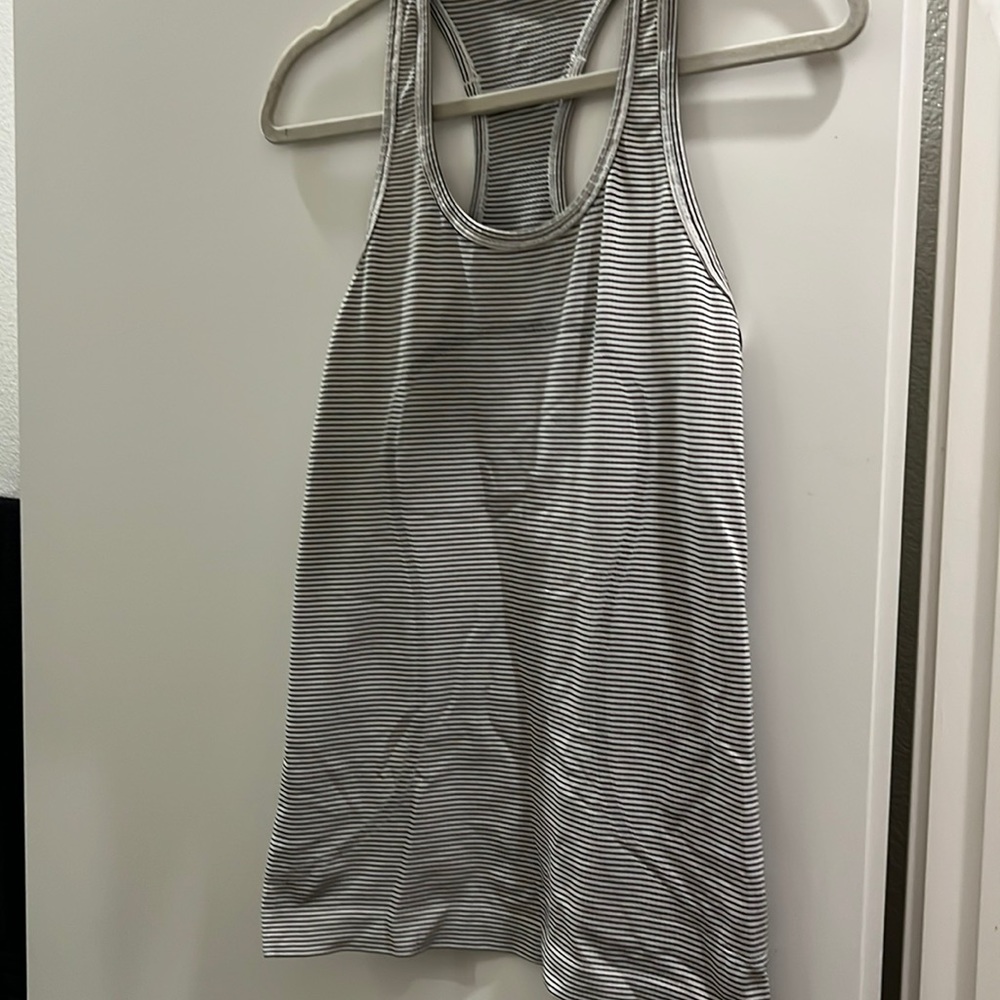 Lululemon swiftly speed racerback. White and black stripe. Size 6.